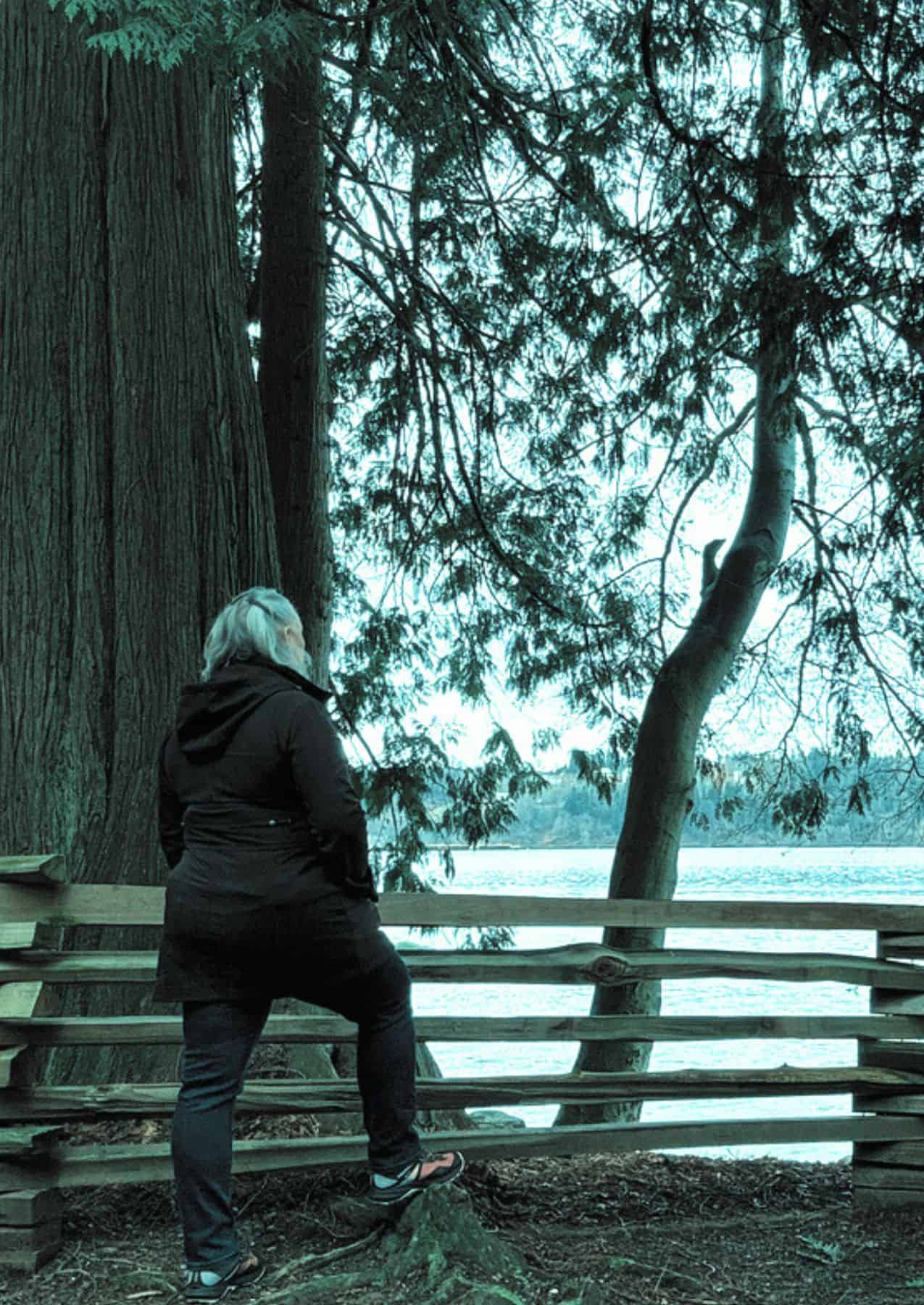 Tammy meditating in nature for a breathwork exercise