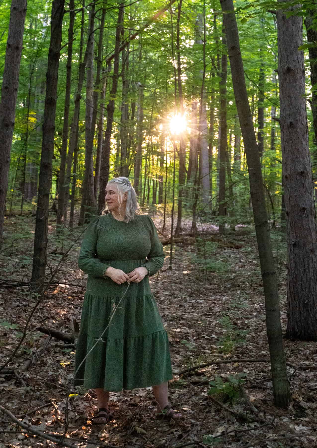 Tammy meditating in nature for a breathwork exercise